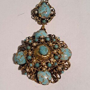 turqouise, pearl colored stones gold ton intricate filigre work necklace Miriam?
